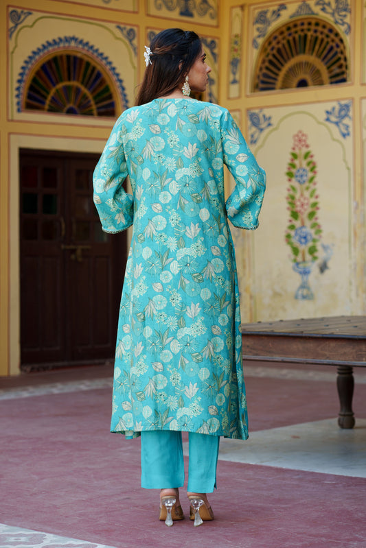 Women Muslin pleated kurta with bead work Neckline & Solid Bottom Set