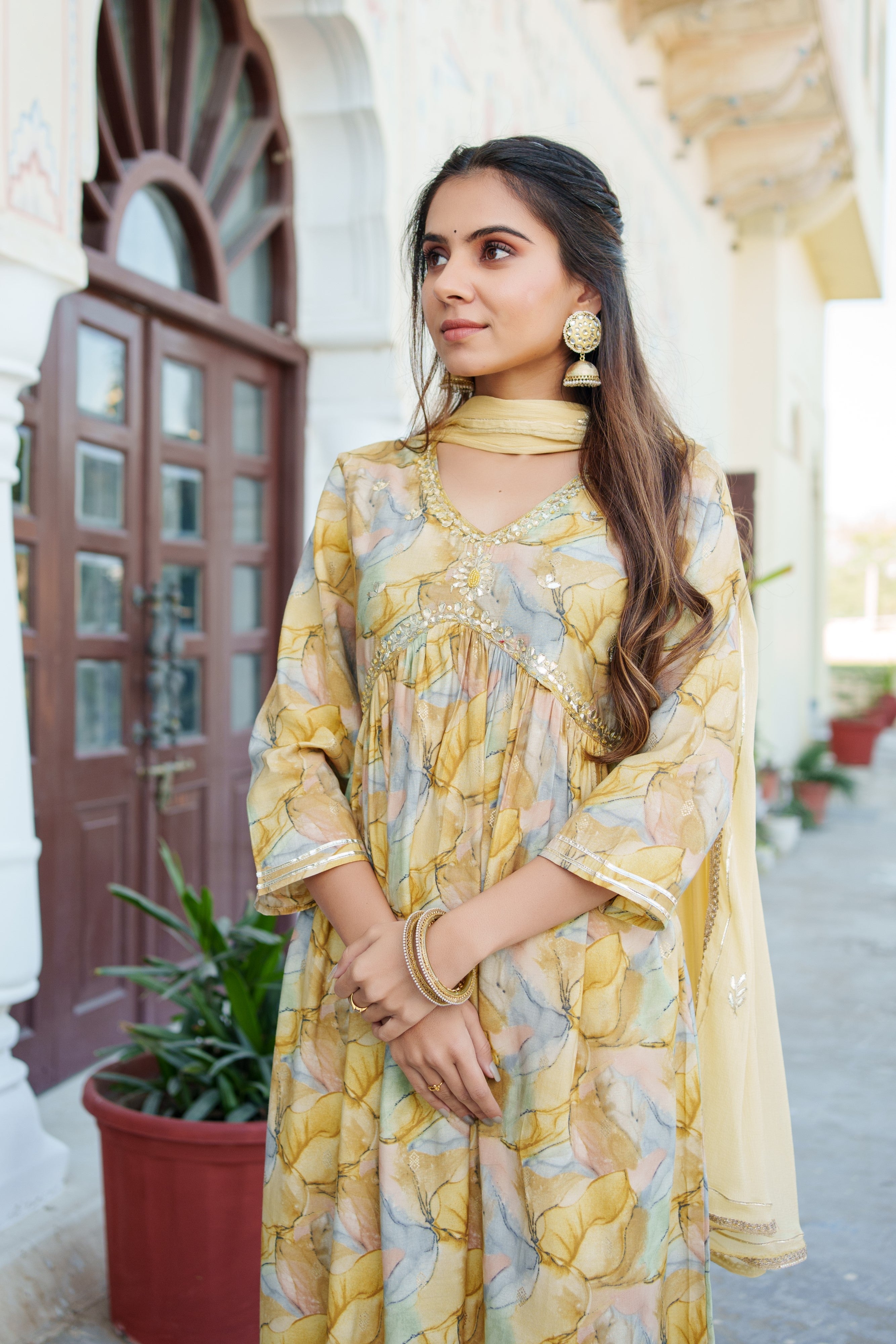 Women Yellow Muslin kurta with  handwork embroidery, solid bottom & Dupatta Set