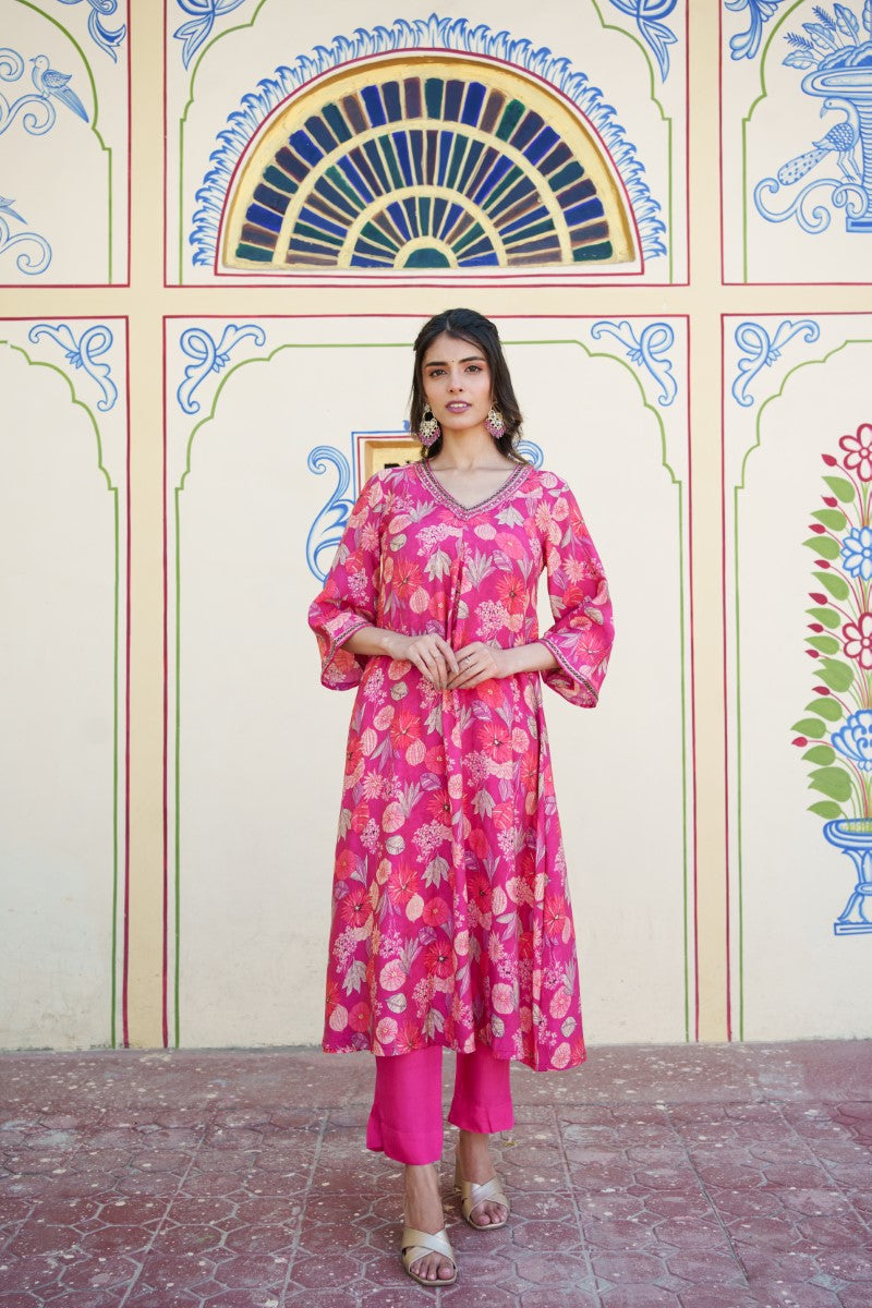 Women Muslin pleated kurta with bead work Neckline & Solid Bottom Set