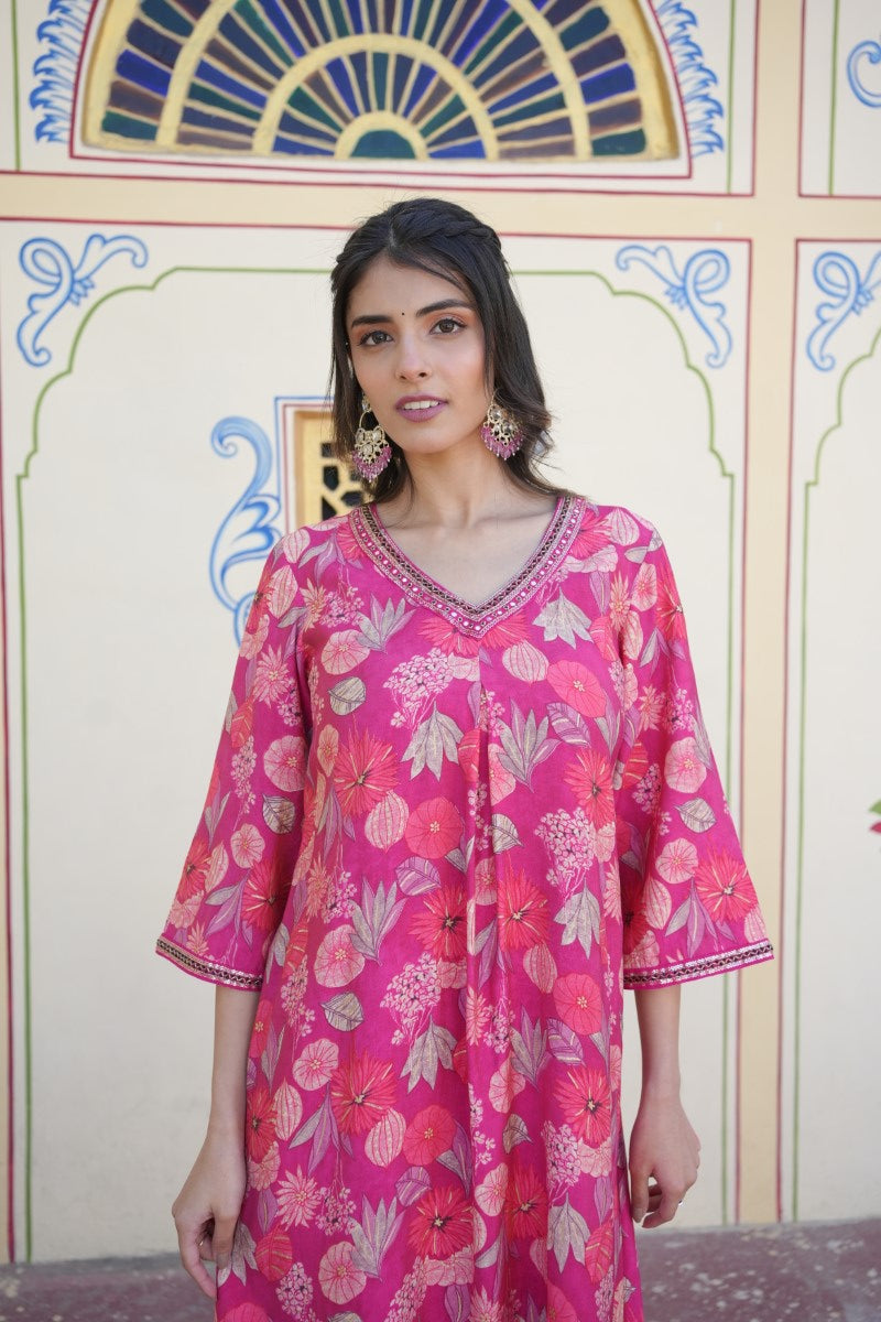 Women Muslin pleated kurta with bead work Neckline & Solid Bottom Set