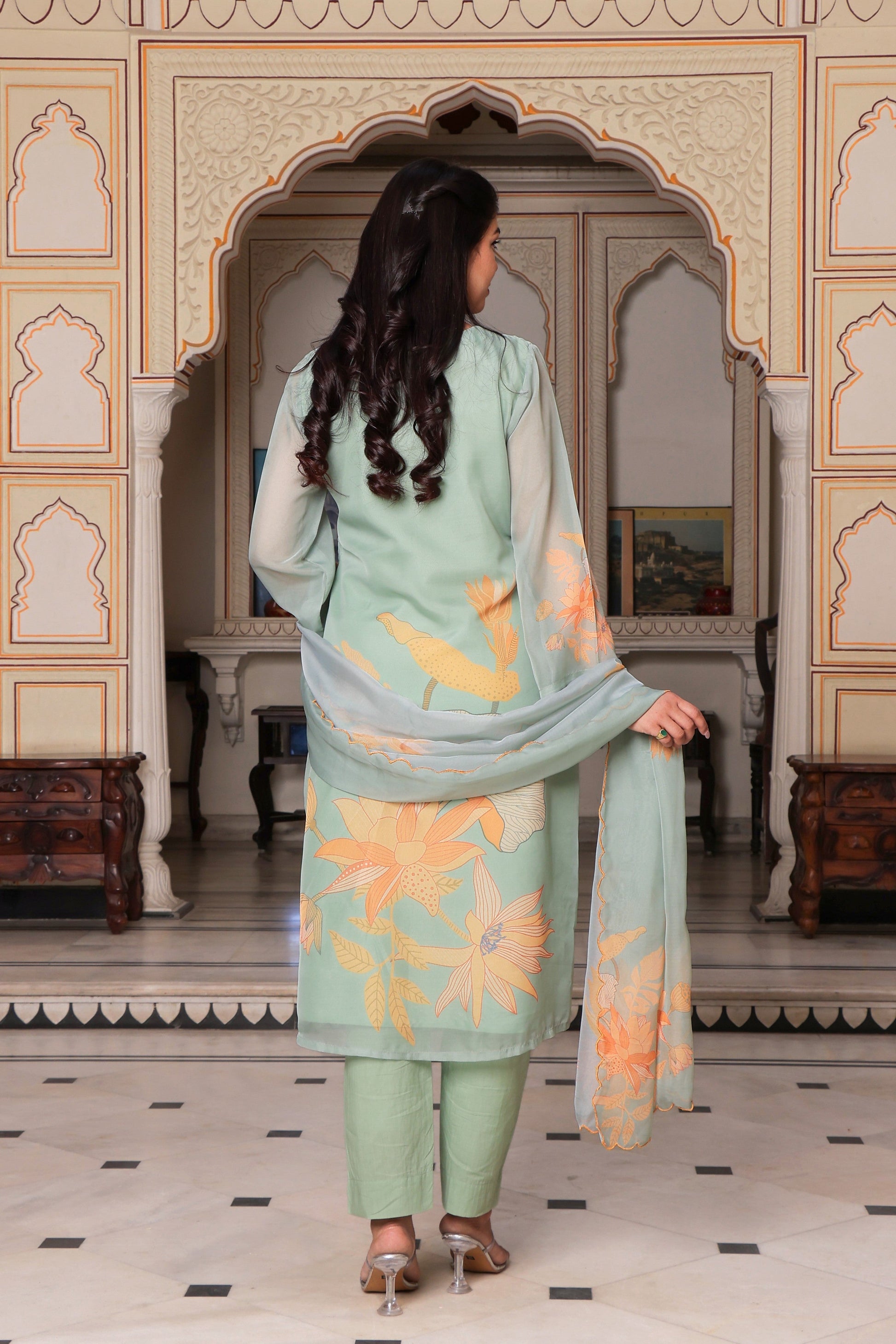 Teal Green Placement print Straight suit set with solid bottom & printed organza cut work dupatta set.