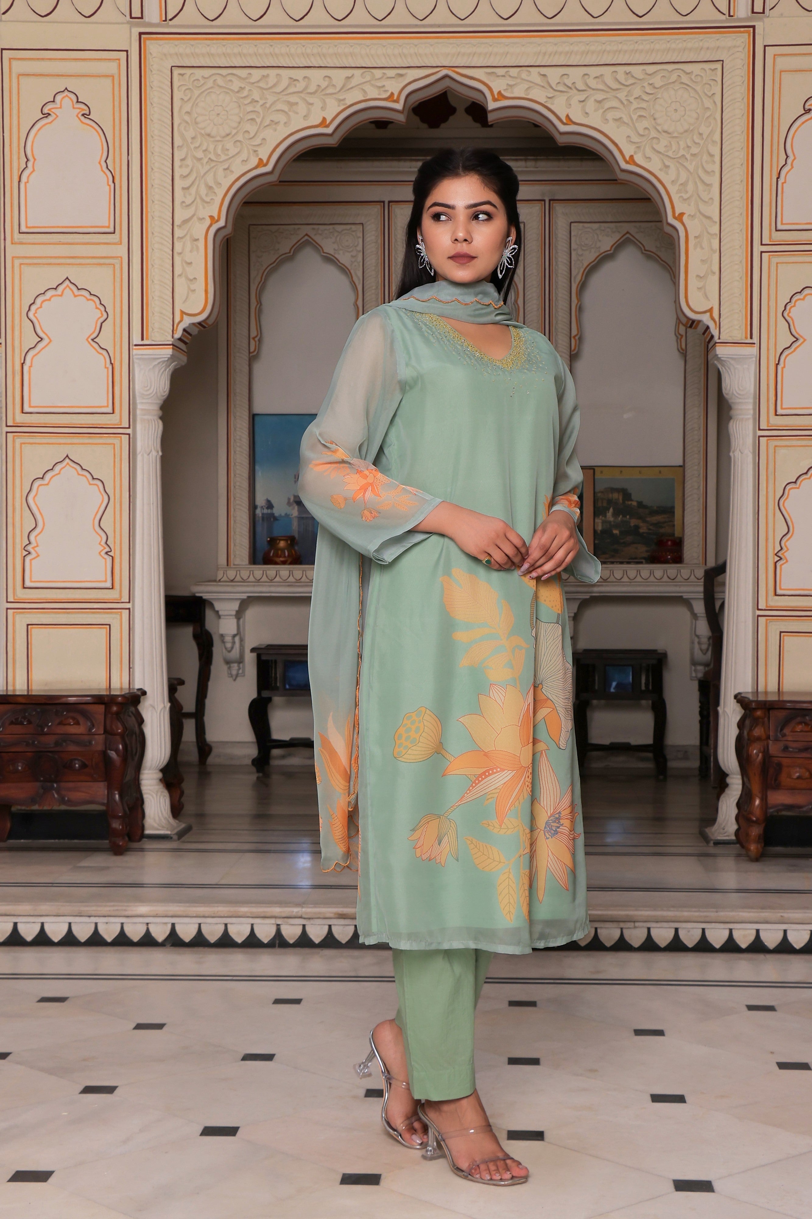 Teal Green Placement print Straight suit set with solid bottom & printed organza cut work dupatta set.