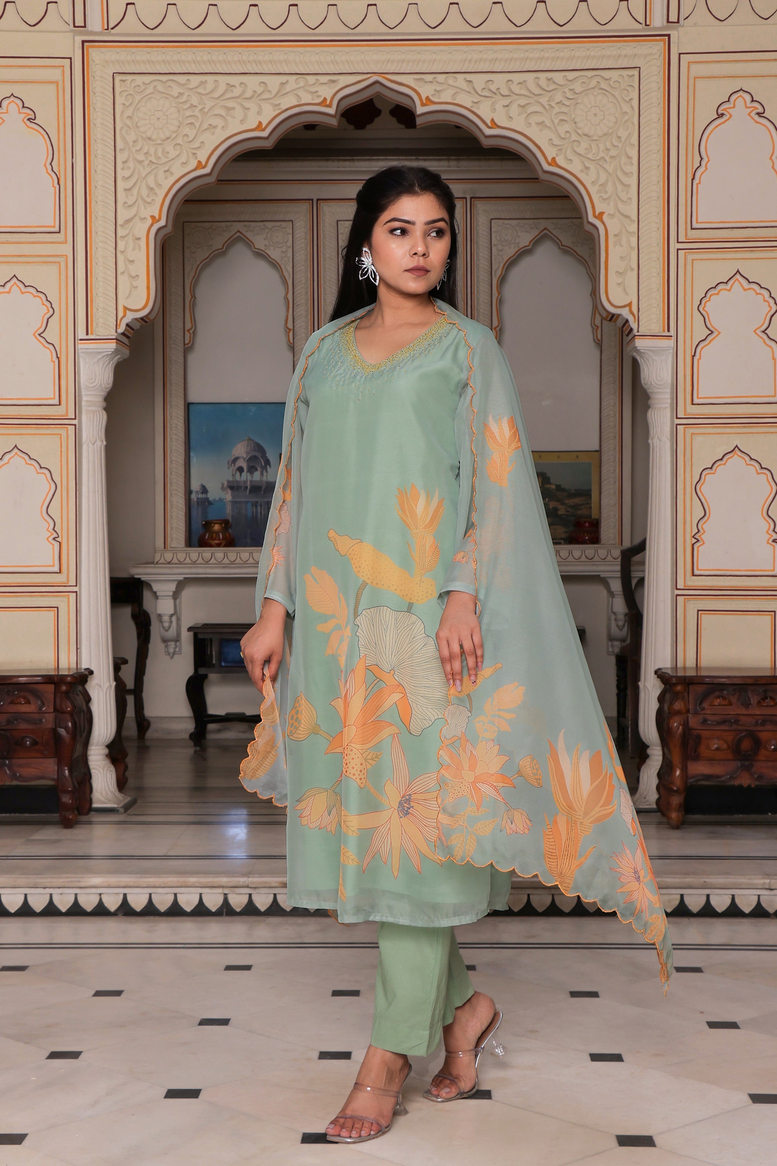 Teal Green Placement print Straight suit set with solid bottom & printed organza cut work dupatta set.