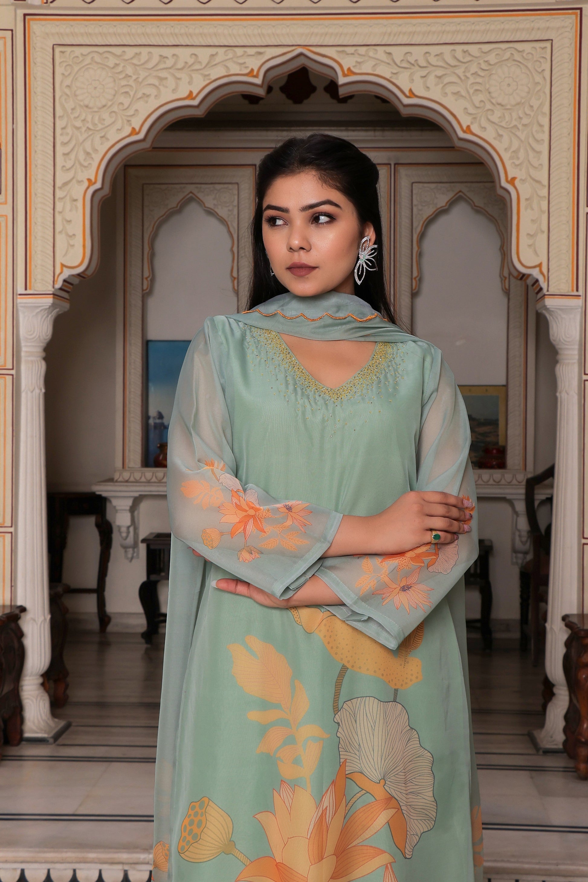 Teal Green Placement print Straight suit set with solid bottom & printed organza cut work dupatta set.