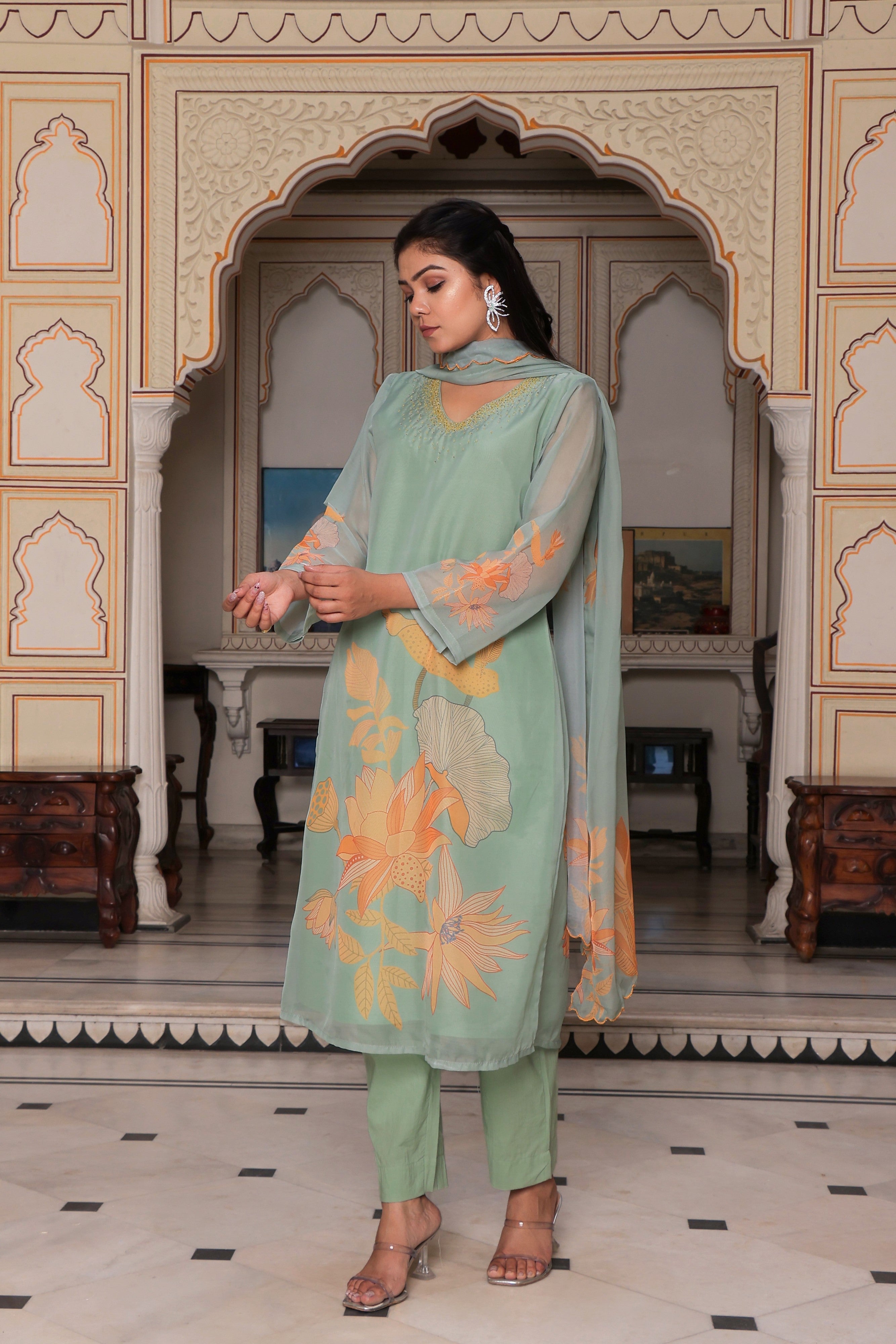 Teal Green Placement print Straight suit set with solid bottom & printed organza cut work dupatta set.