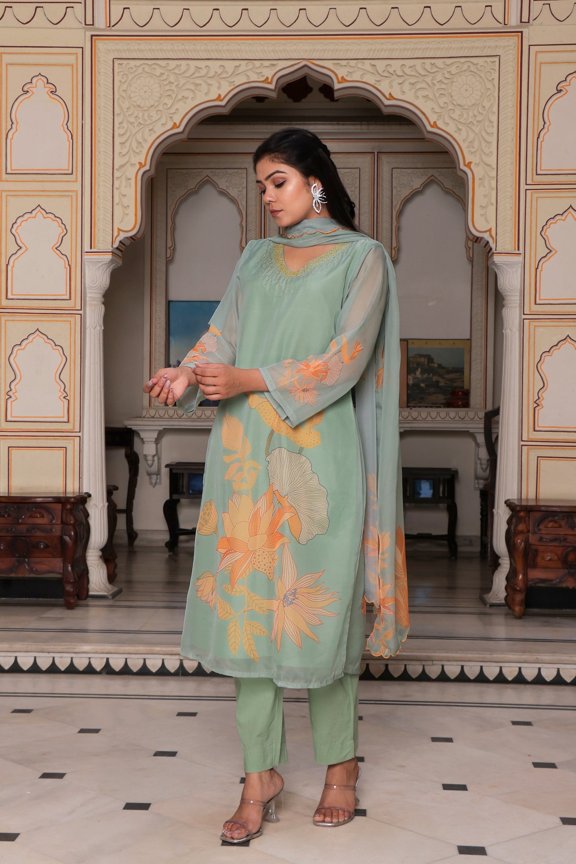 Teal Green Placement print Straight suit set with solid bottom & printed organza cut work dupatta set.