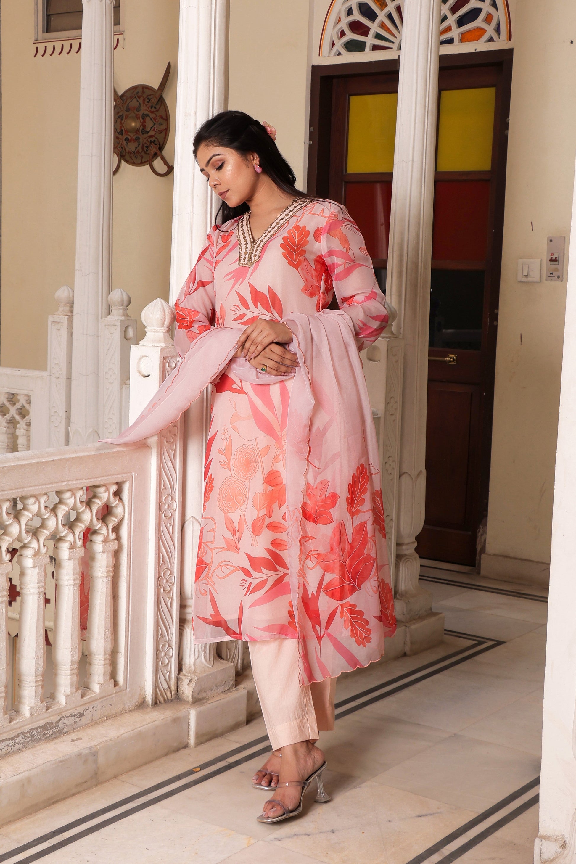 Peach Placement print collared Straight suit set with solid bottom & printed organza cut work dupatta set.