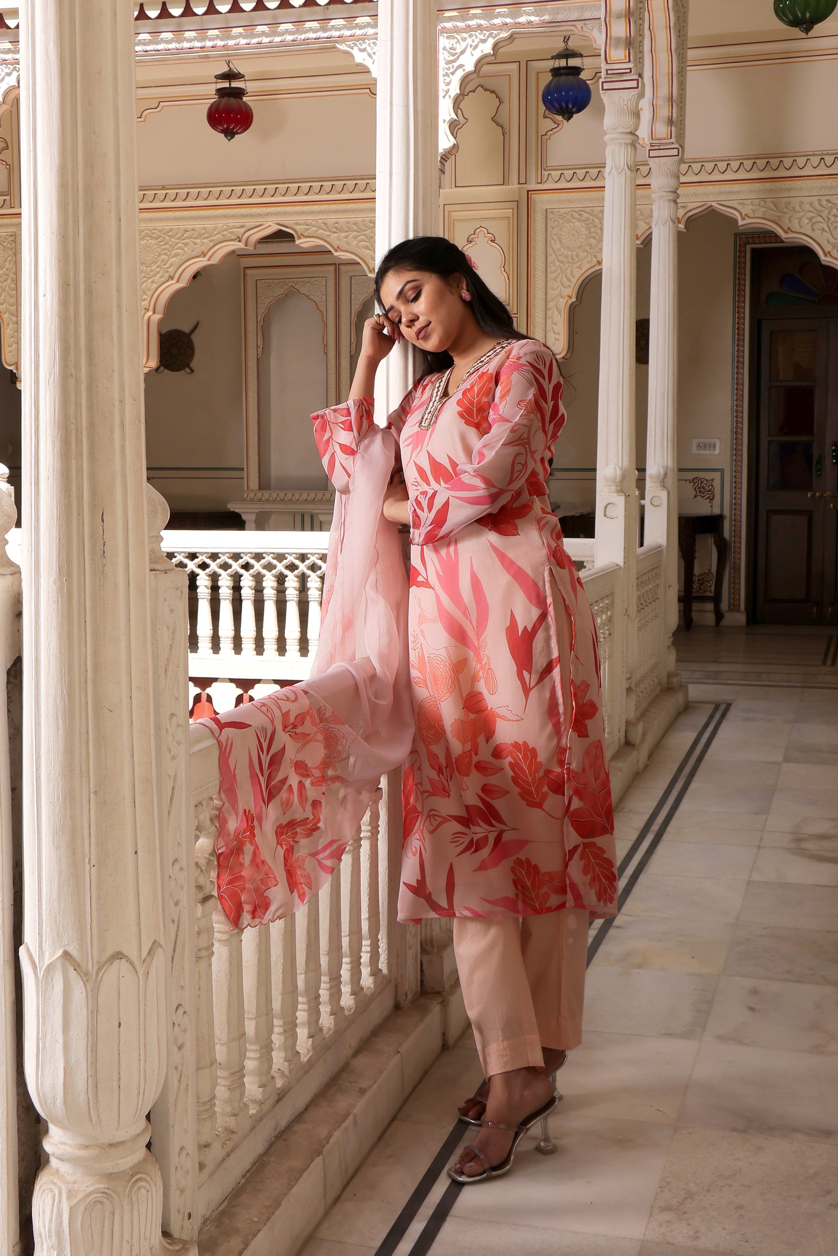 Peach Placement print collared Straight suit set with solid bottom & printed organza cut work dupatta set.