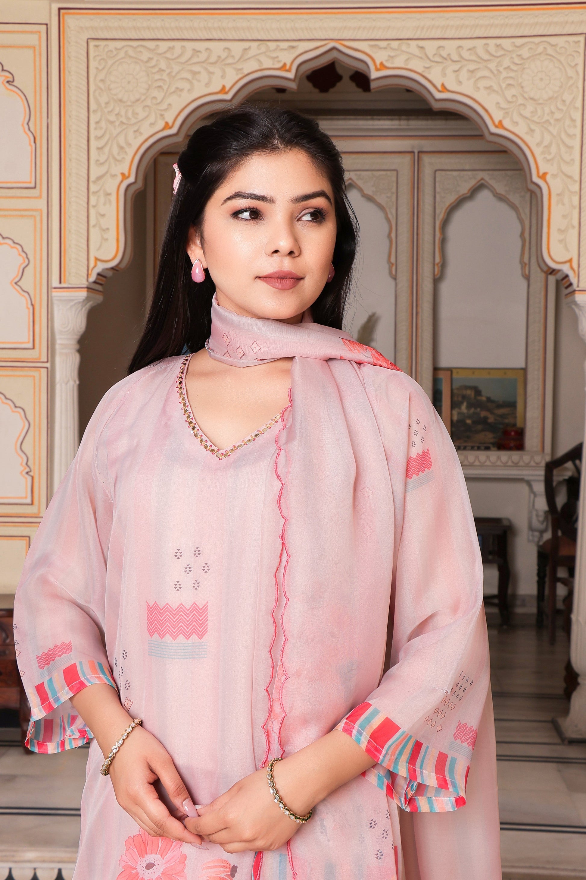 Beige Placement print V neck Straight suit set with solid bottom & printed organza cut work dupatta set.