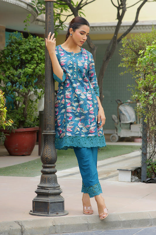 Women cyan embroidered printed  kurta set with laced solid pants