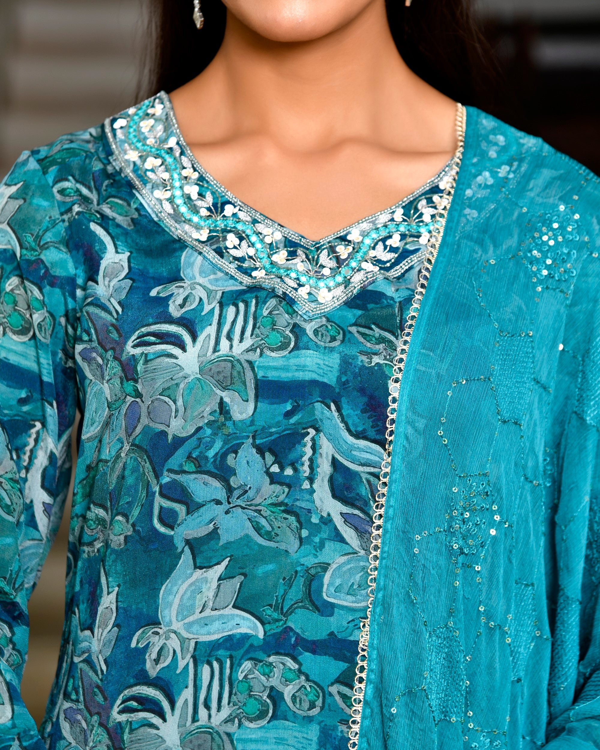 Women crepe embroidered suit set