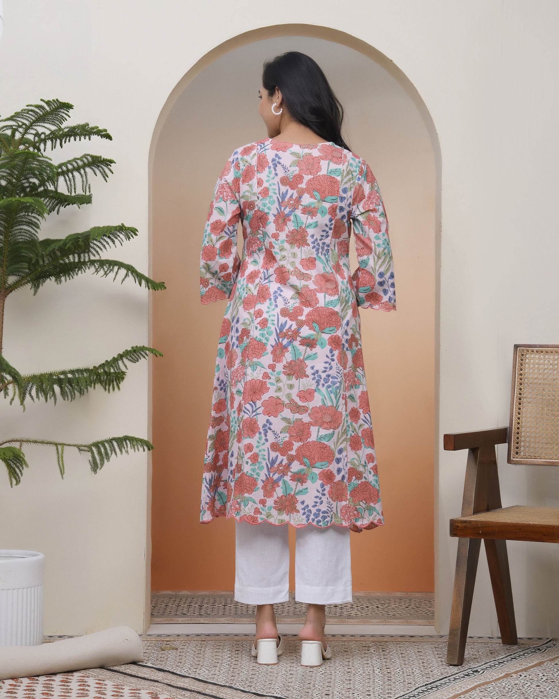 Women Peach floral Cotton printed flare Kurti