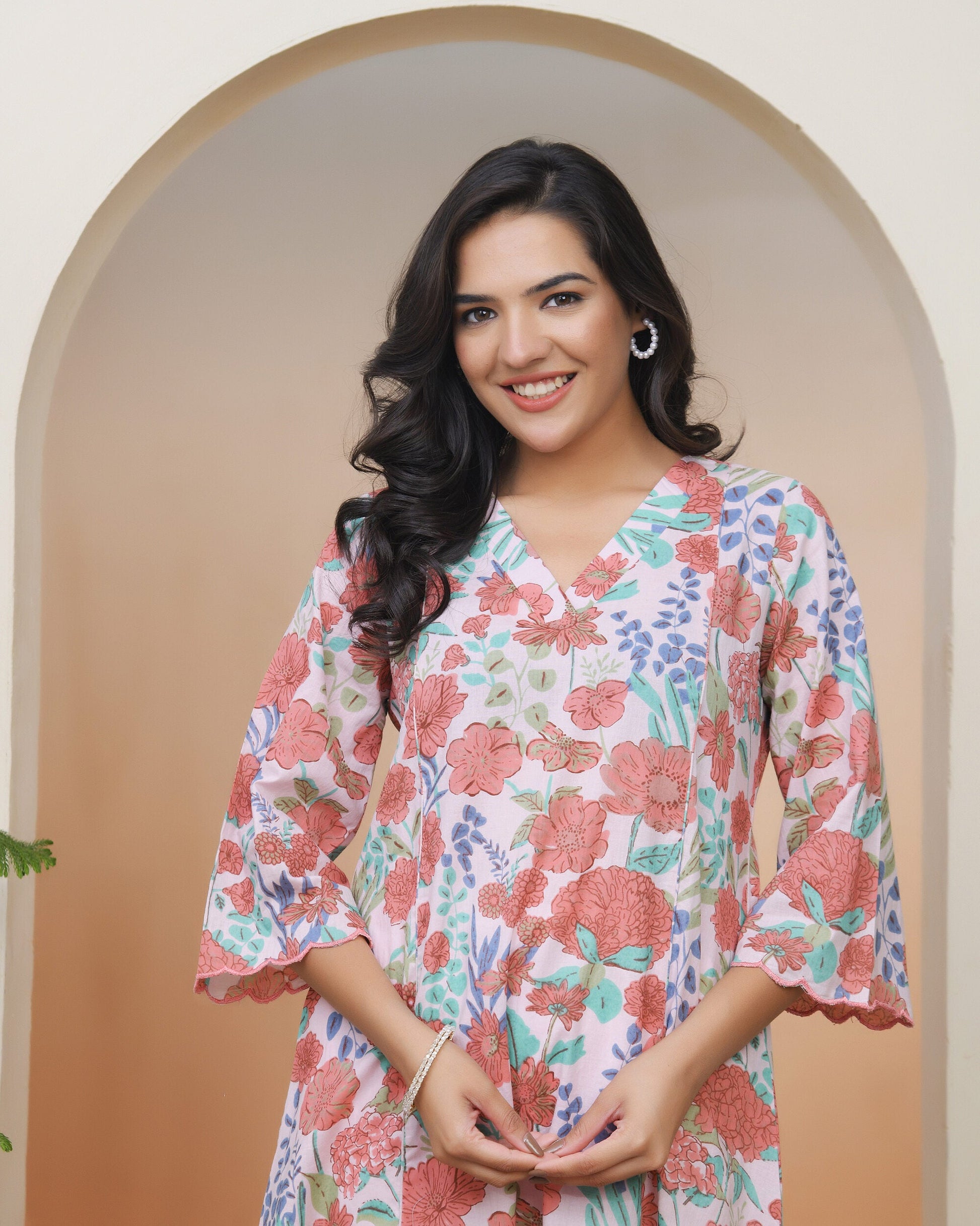 Women Peach floral Cotton printed flare Kurti