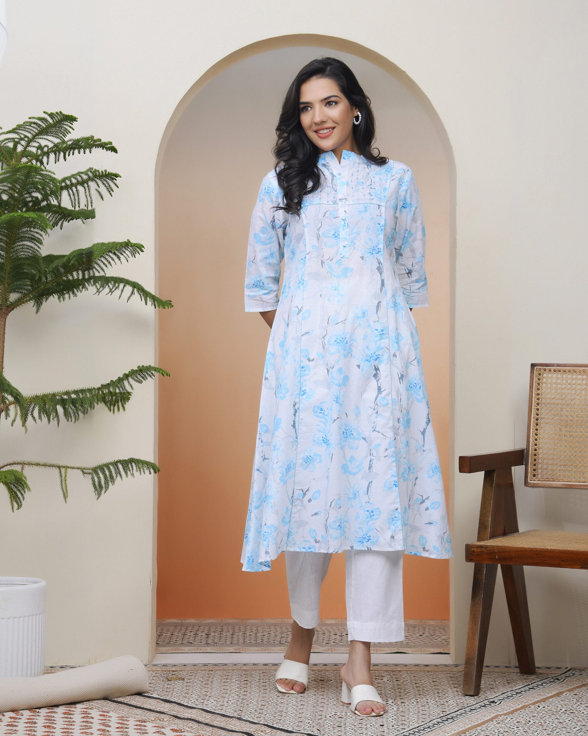 Women white floral Cotton printed flare Kurti