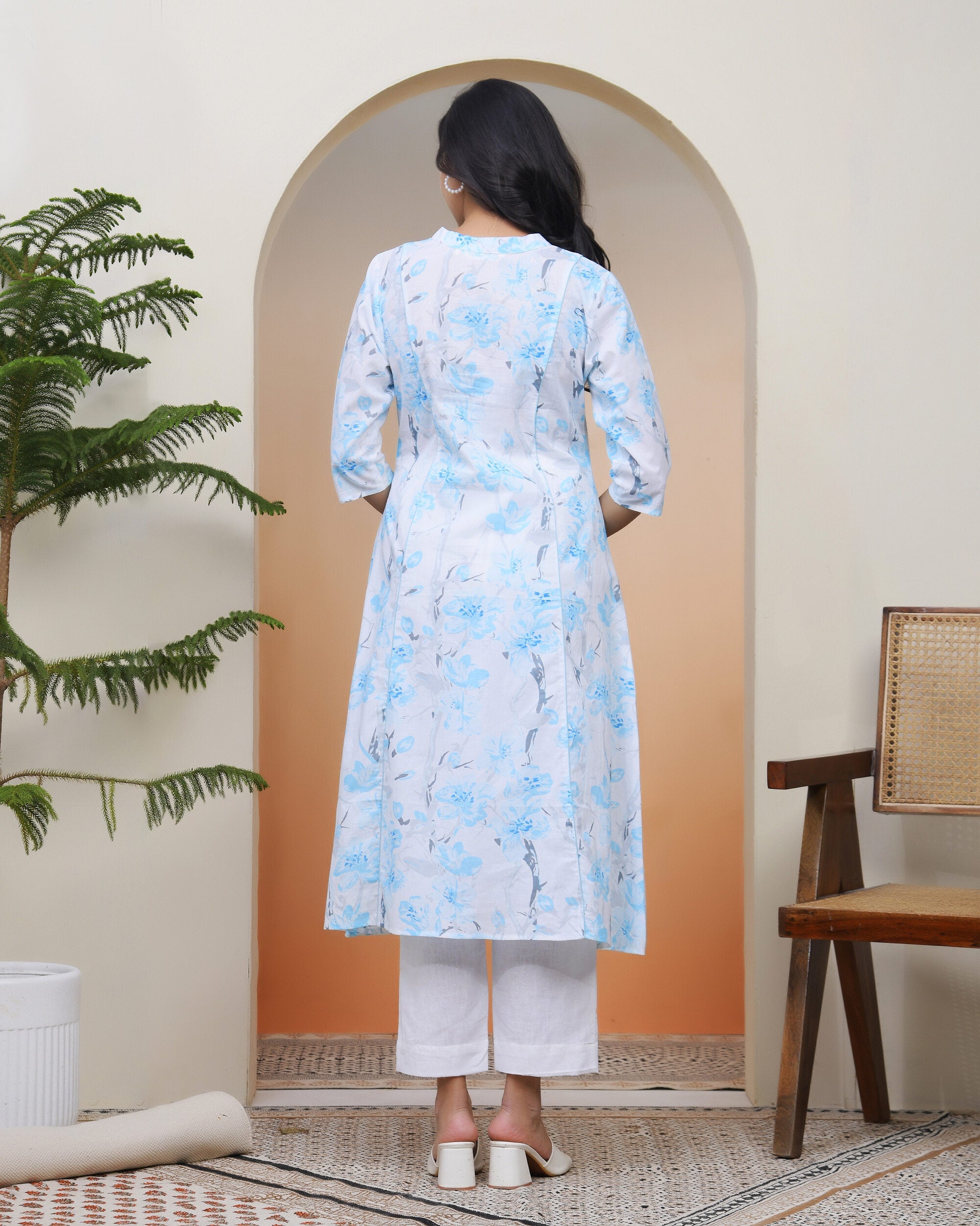 Women white floral Cotton printed flare Kurti